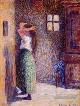  camille peintre - jeune paysanne à sa toilette 1888 Camille Pissarro